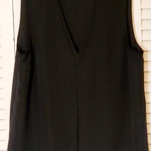 Women's blouse black with gold zipper accents